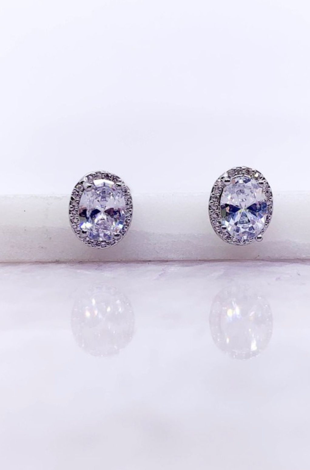 Pronged CZ Cubic Zirconia Oval Post Earrings